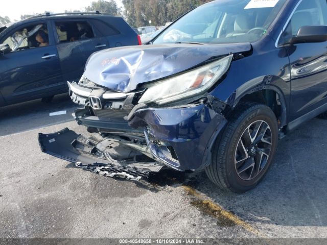 Photo 5 VIN: 2HKRM3H4XGH533216 - HONDA CR-V 