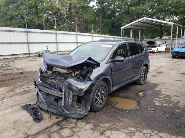 Photo 1 VIN: 2HKRM3H4XGH548363 - HONDA CR-V SE 