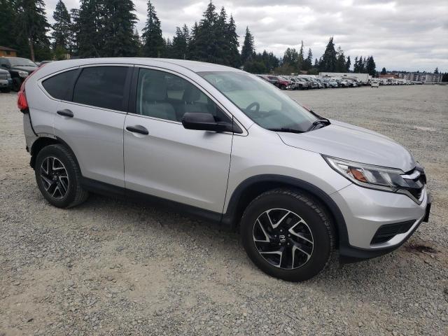 Photo 3 VIN: 2HKRM3H4XGH554549 - HONDA CR-V SE 