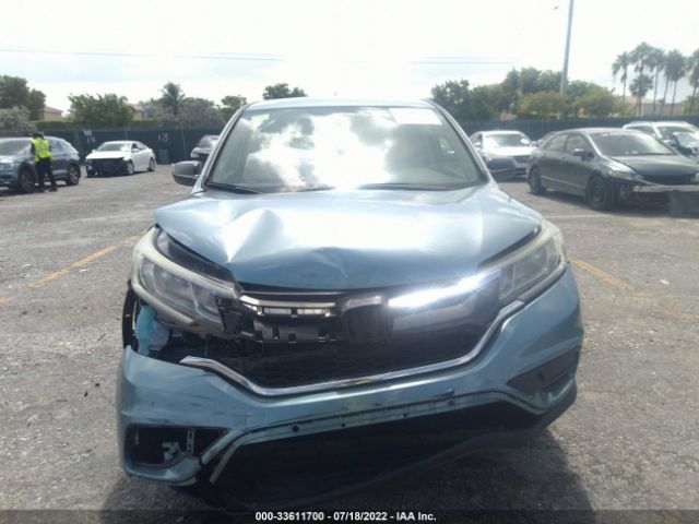 Photo 5 VIN: 2HKRM3H4XGH556057 - HONDA CR-V 