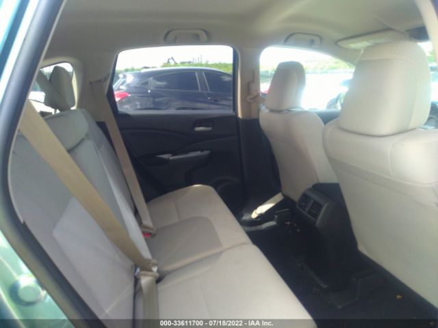 Photo 7 VIN: 2HKRM3H4XGH556057 - HONDA CR-V 