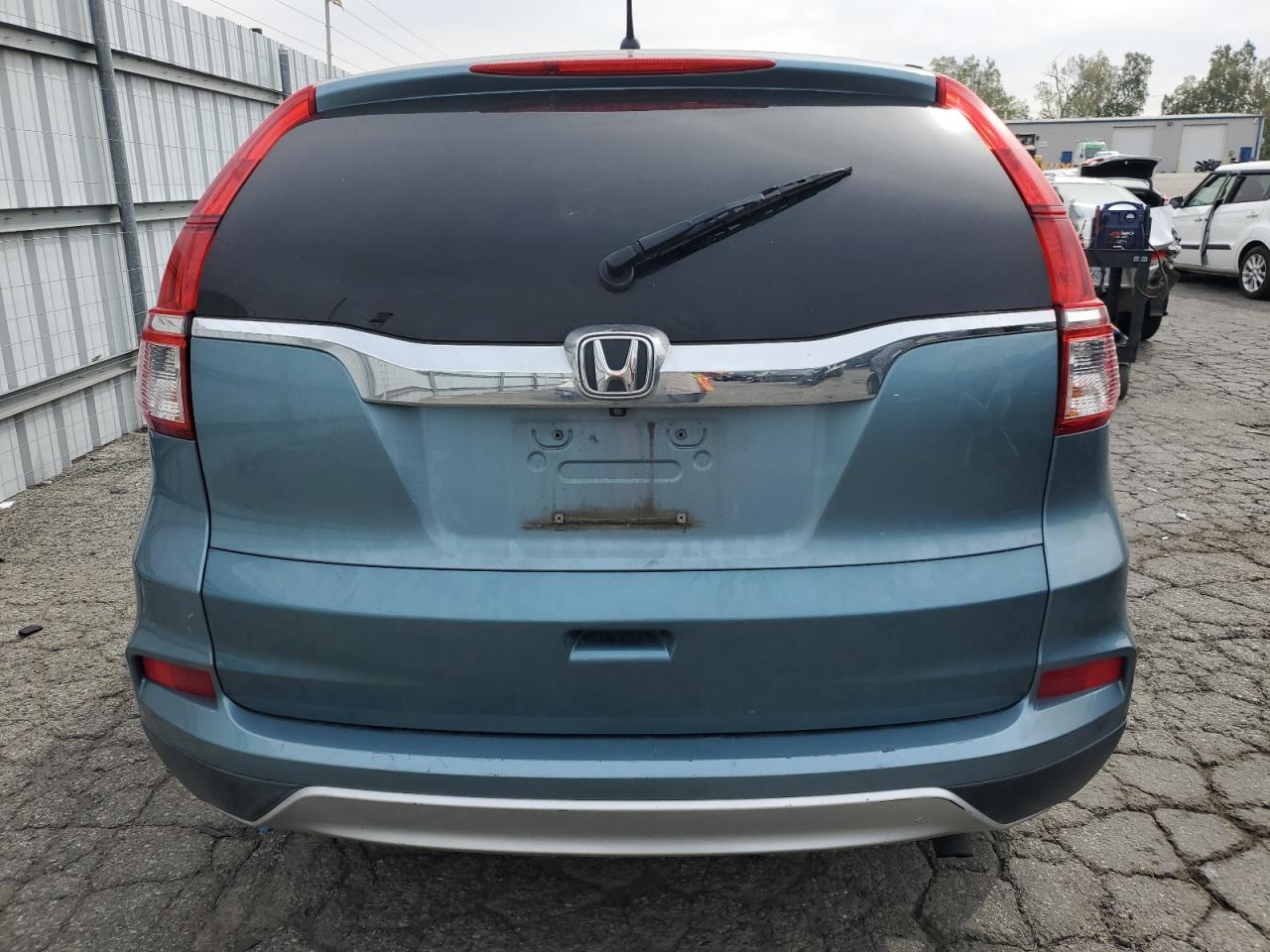 Photo 5 VIN: 2HKRM3H57GH515104 - HONDA CR-V 