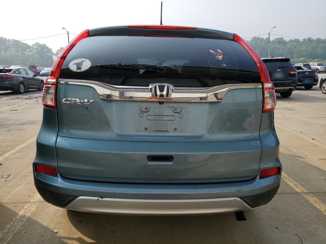 Photo 5 VIN: 2HKRM3H57GH566960 - HONDA CR-V 