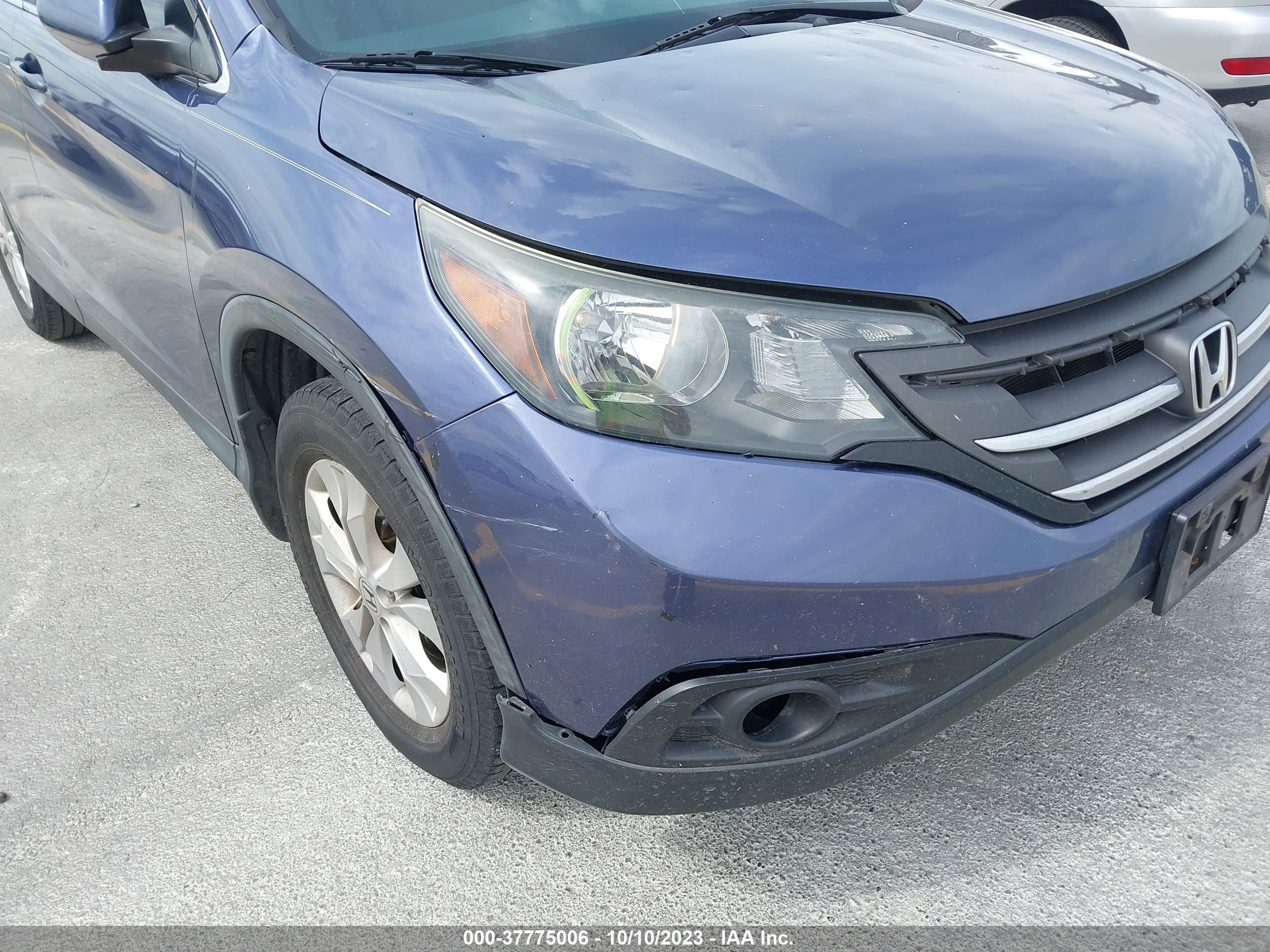 Photo 5 VIN: 2HKRM3H58EH503217 - HONDA CR-V 