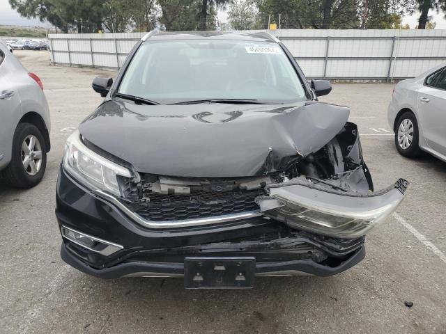 Photo 4 VIN: 2HKRM3H71GH566759 - HONDA CRV 