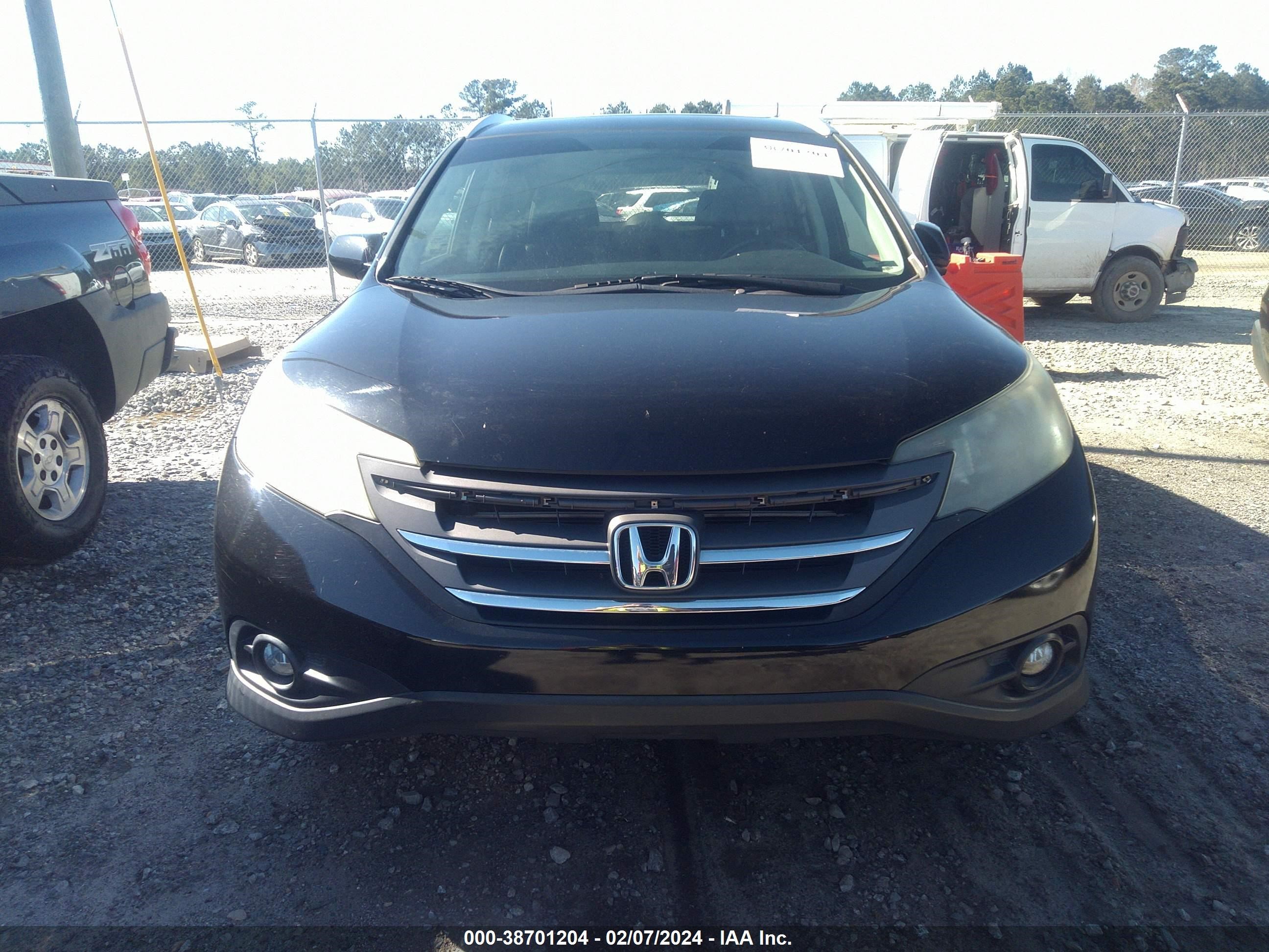 Photo 11 VIN: 2HKRM3H72EH506423 - HONDA CR-V 