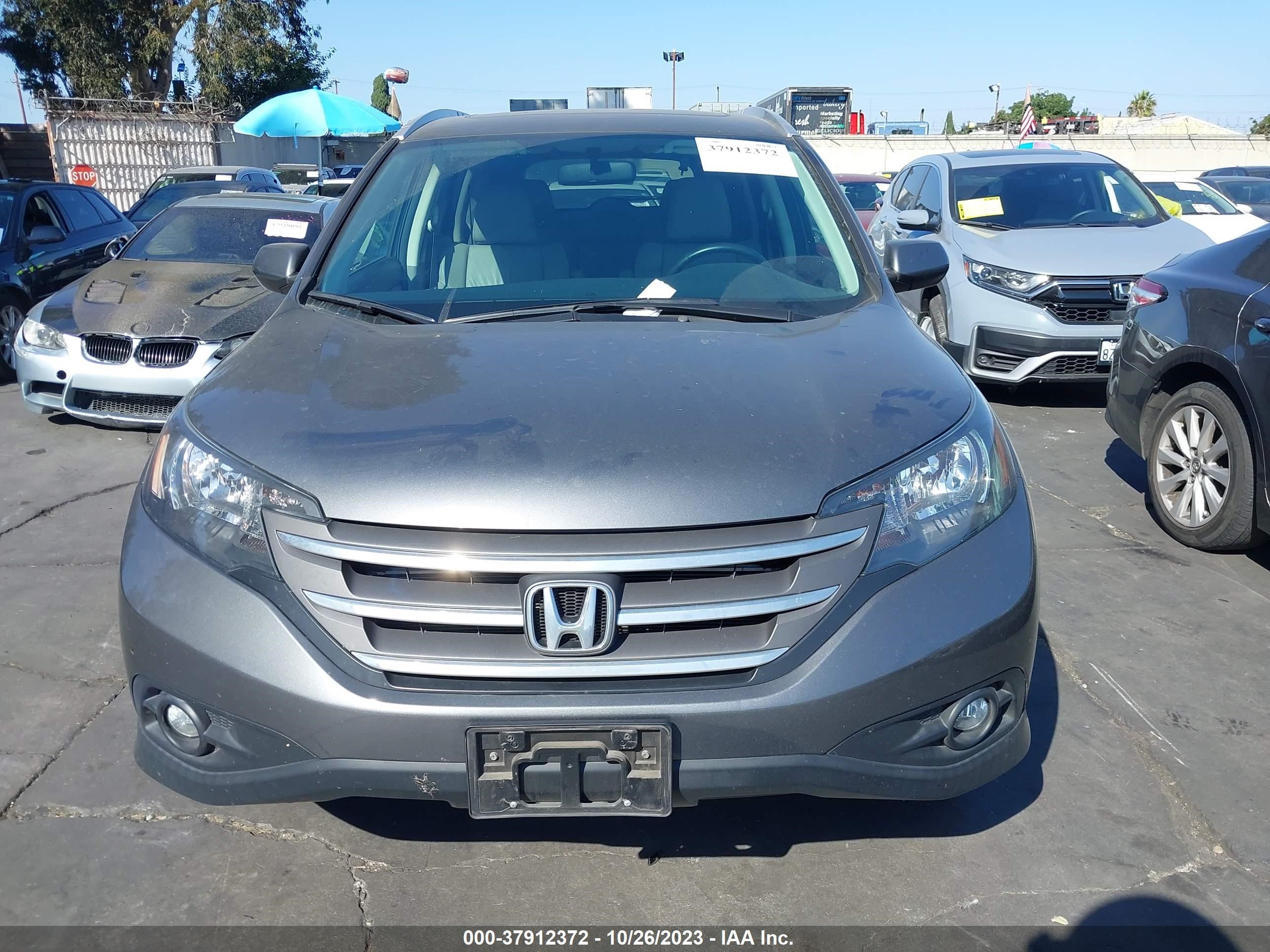 Photo 11 VIN: 2HKRM3H74EH500770 - HONDA CR-V 