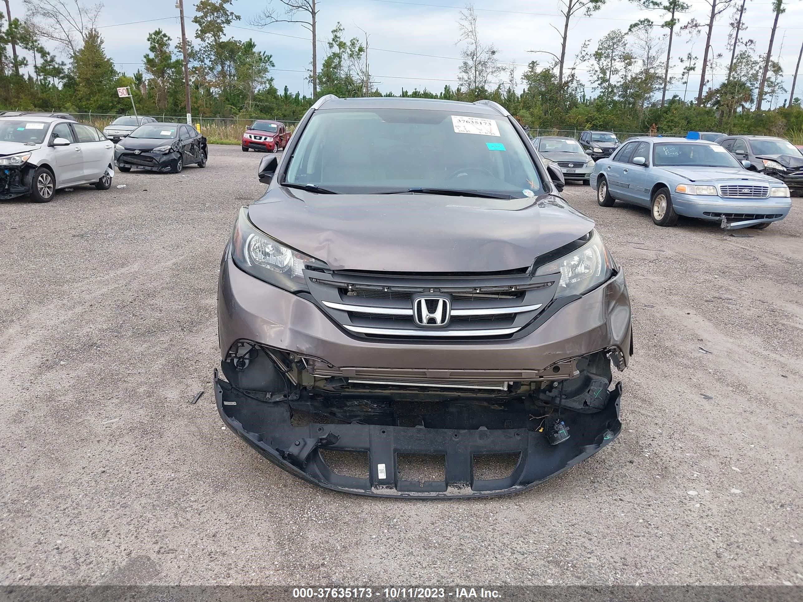 Photo 11 VIN: 2HKRM3H74EH514121 - HONDA CR-V 