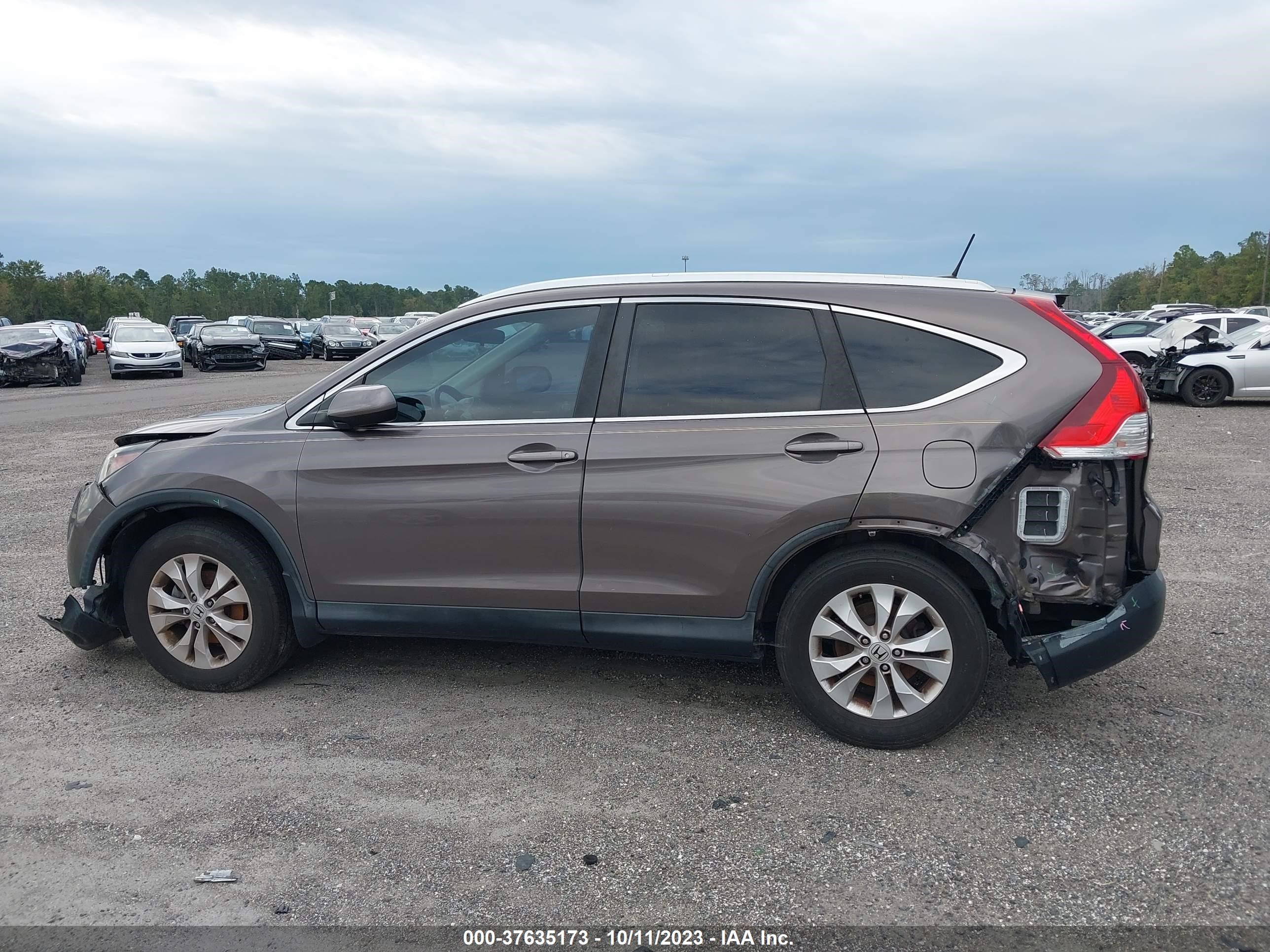 Photo 13 VIN: 2HKRM3H74EH514121 - HONDA CR-V 