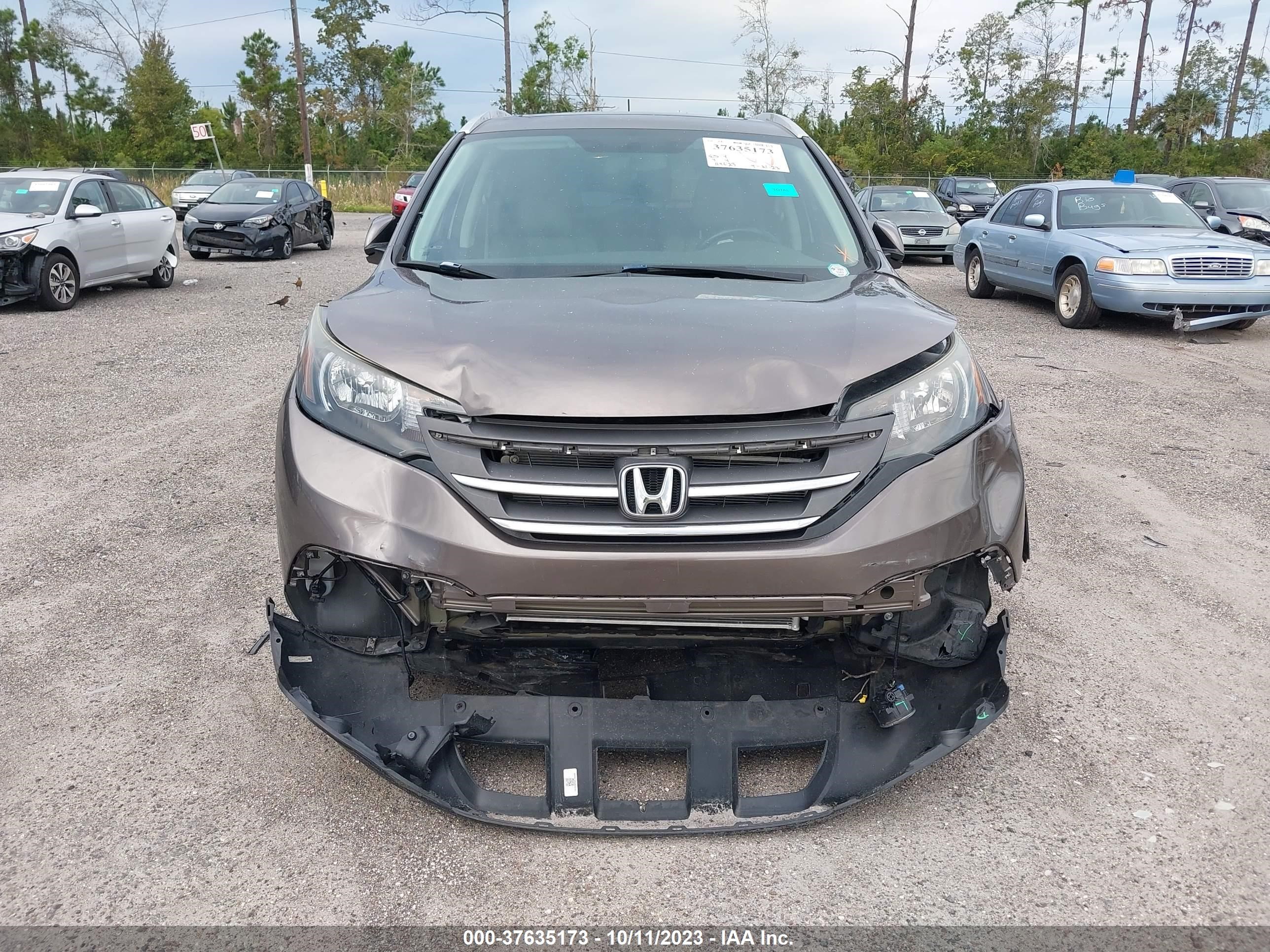 Photo 5 VIN: 2HKRM3H74EH514121 - HONDA CR-V 