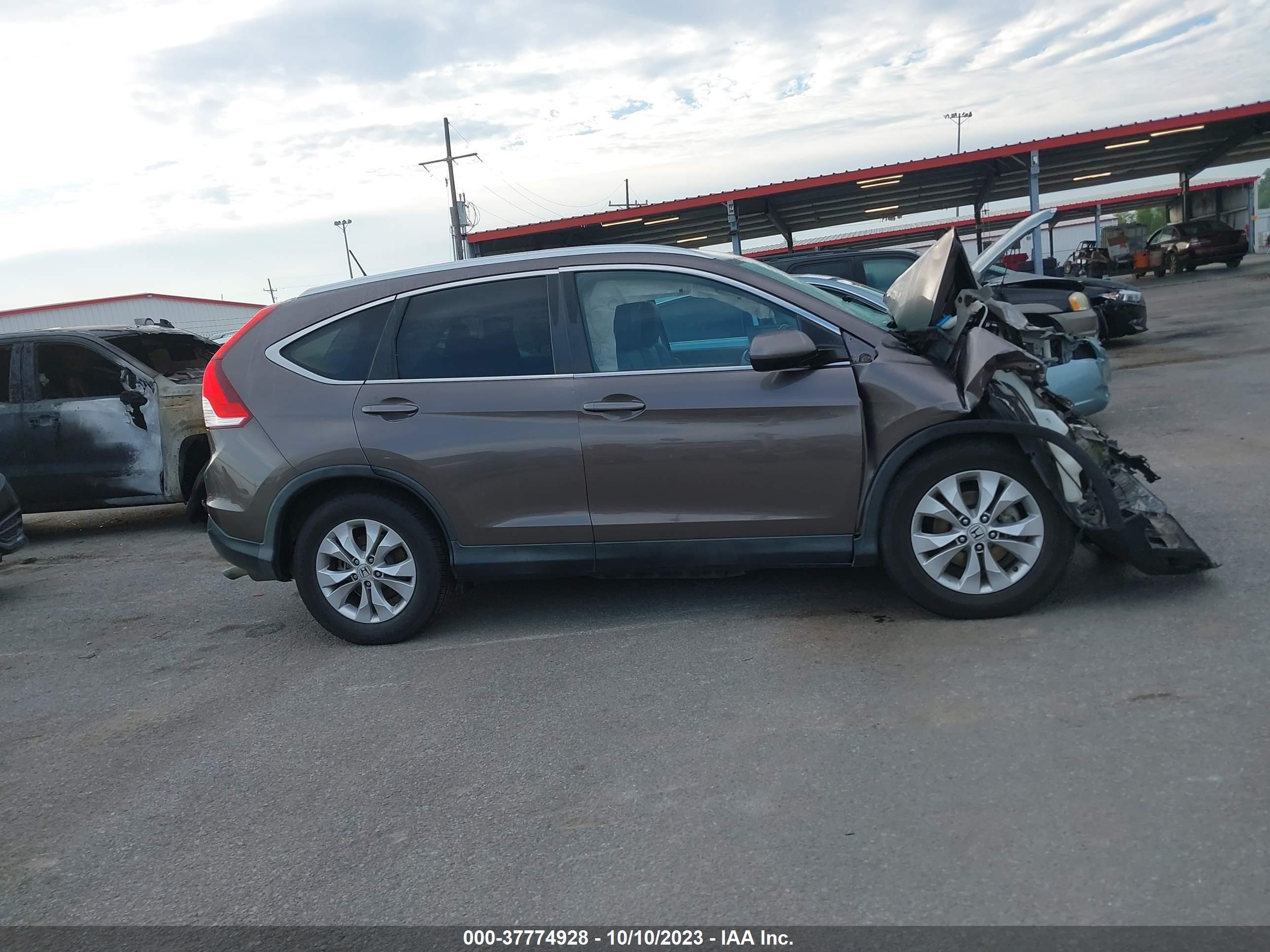 Photo 12 VIN: 2HKRM3H74EH531808 - HONDA CR-V 