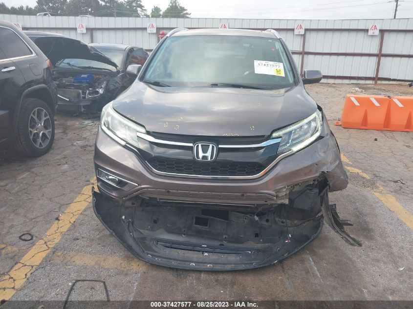 Photo 11 VIN: 2HKRM3H74GH523355 - HONDA CR-V 