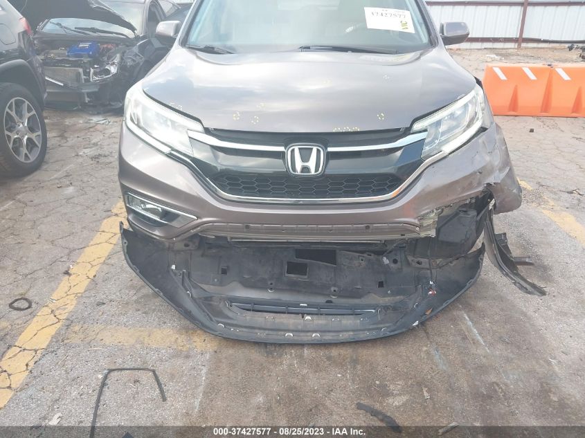 Photo 5 VIN: 2HKRM3H74GH523355 - HONDA CR-V 