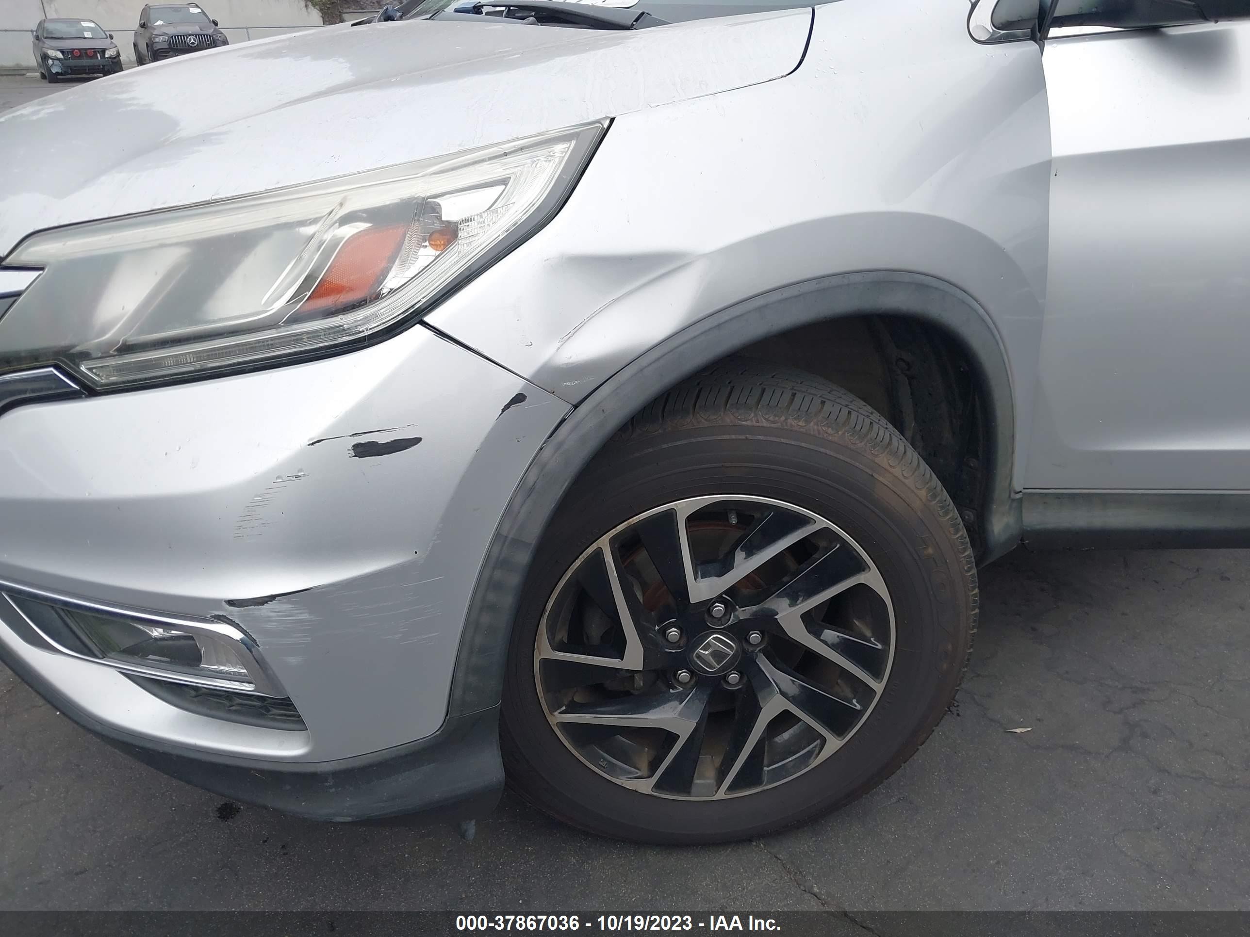 Photo 11 VIN: 2HKRM3H75GH555814 - HONDA CR-V 