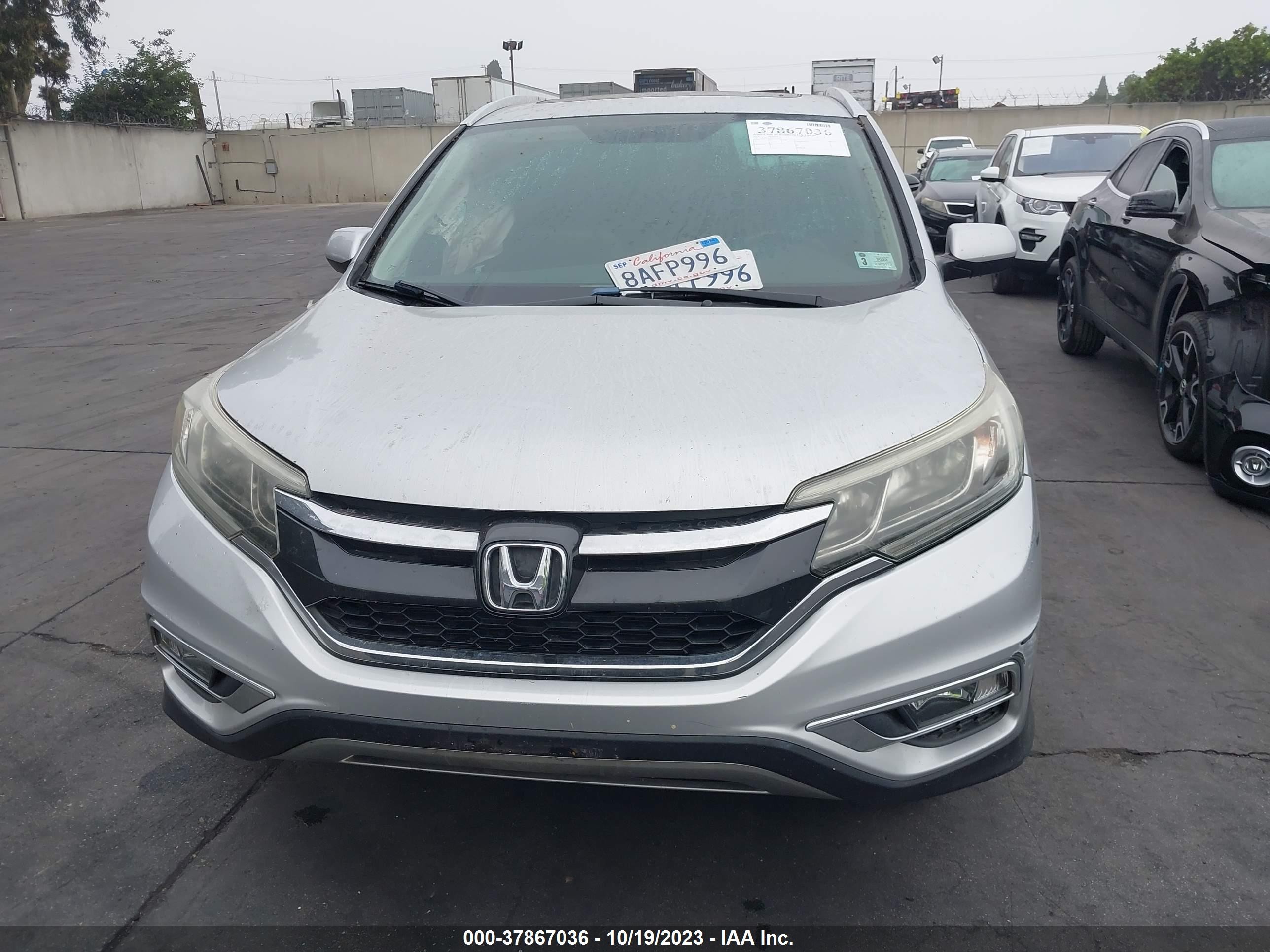 Photo 12 VIN: 2HKRM3H75GH555814 - HONDA CR-V 