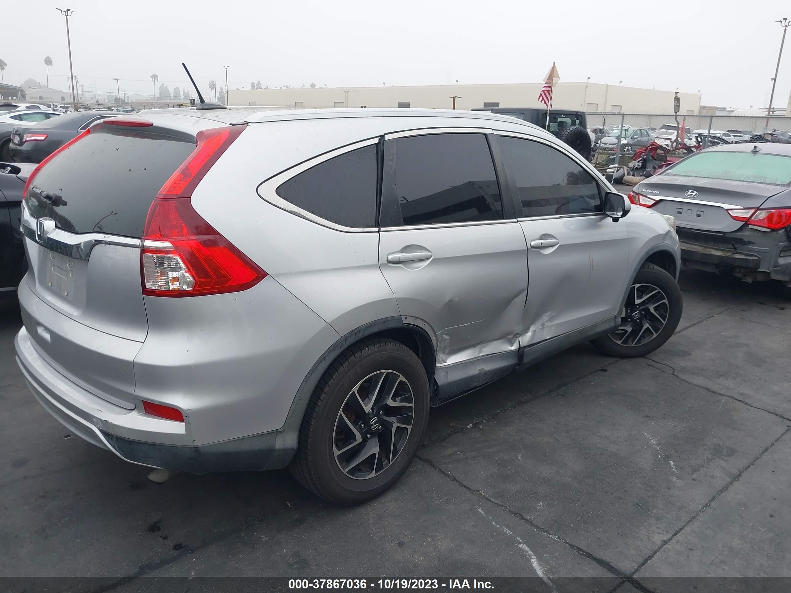 Photo 3 VIN: 2HKRM3H75GH555814 - HONDA CR-V 