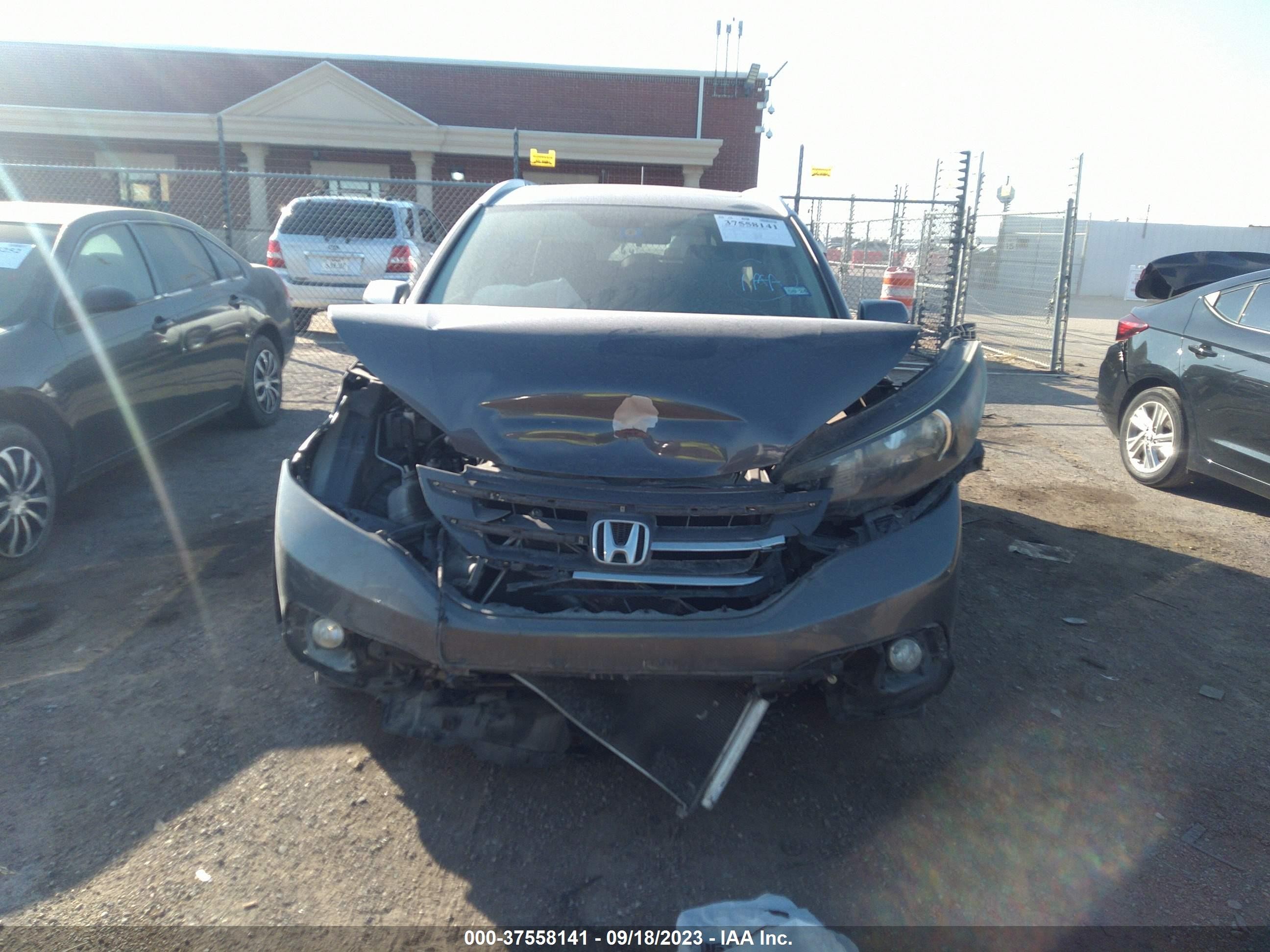 Photo 10 VIN: 2HKRM3H76EH500804 - HONDA CR-V 