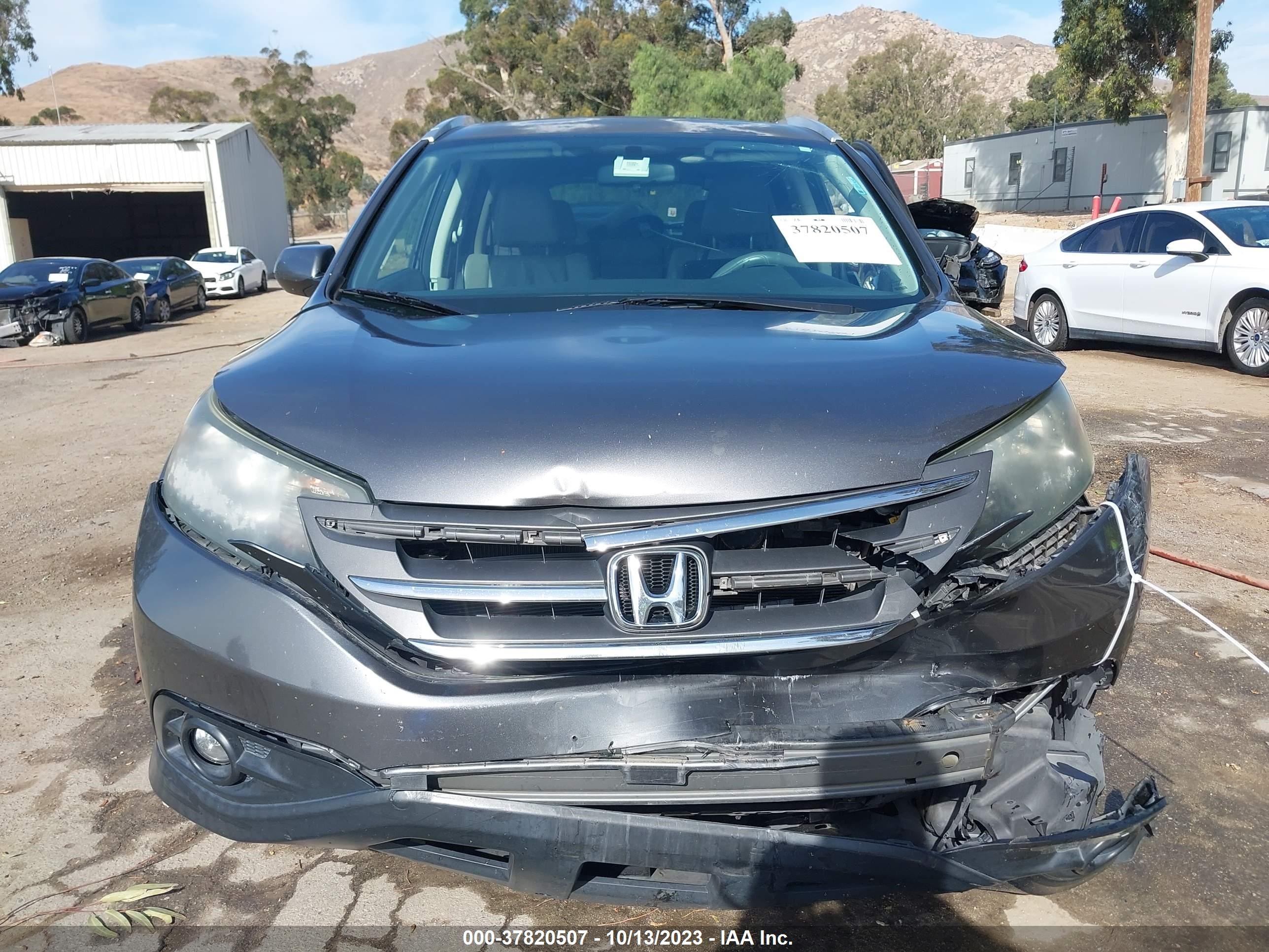 Photo 10 VIN: 2HKRM3H76EH524617 - HONDA CR-V 