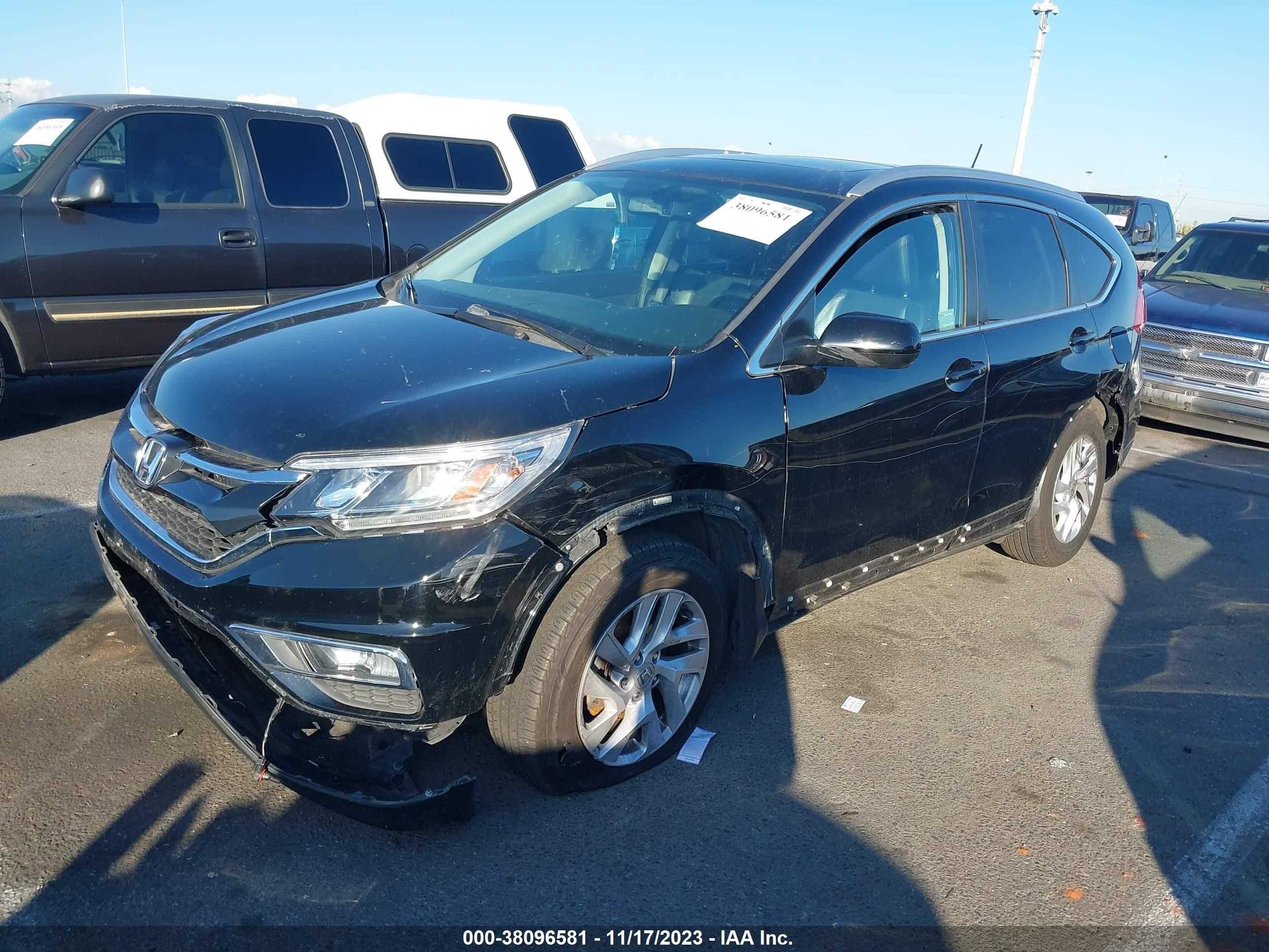 Photo 5 VIN: 2HKRM3H77FH547924 - HONDA CR-V 