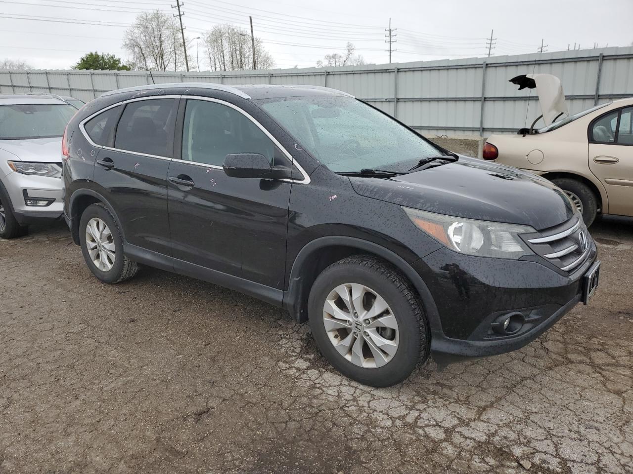 Photo 3 VIN: 2HKRM3H78EH551205 - HONDA CR-V 