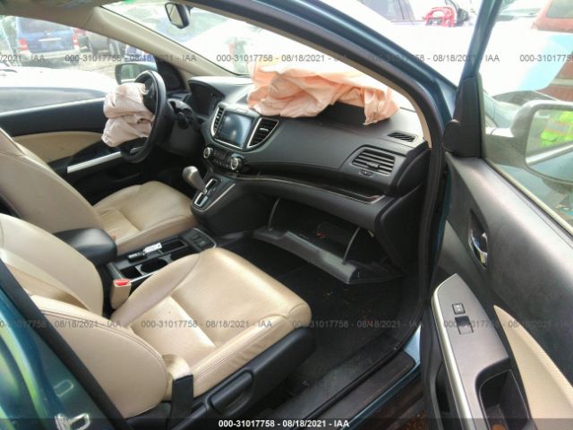 Photo 4 VIN: 2HKRM3H7XGH509606 - HONDA CR-V 