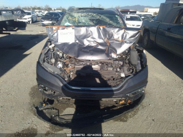 Photo 5 VIN: 2HKRM3H7XGH522470 - HONDA CR-V 