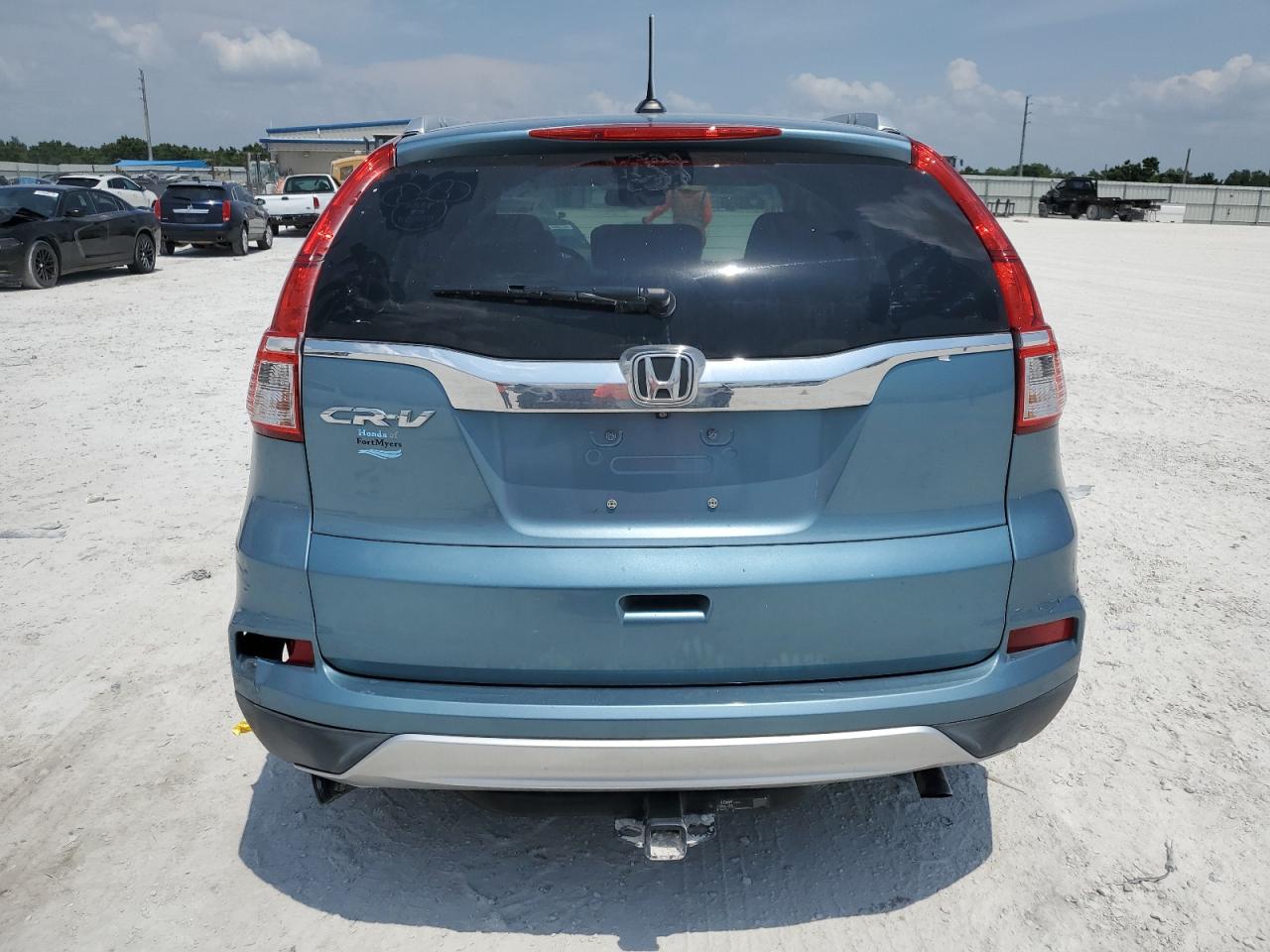 Photo 5 VIN: 2HKRM3H7XGH544484 - HONDA CR-V 