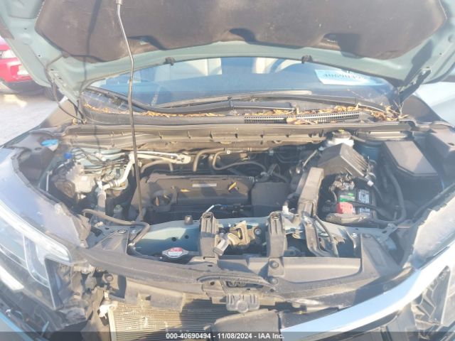 Photo 9 VIN: 2HKRM3H7XGH565514 - HONDA CR-V 