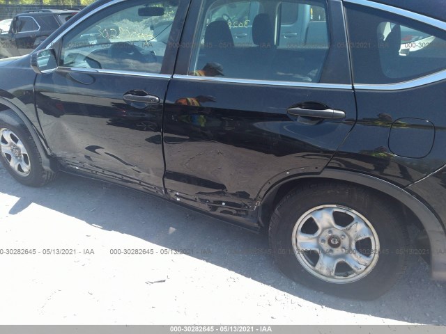 Photo 5 VIN: 2HKRM4H30EH677173 - HONDA CR-V 