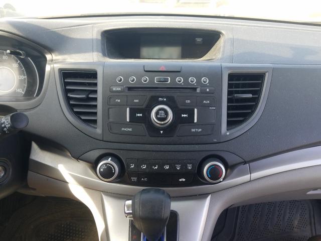 Photo 8 VIN: 2HKRM4H30EH698508 - HONDA CR-V LX 