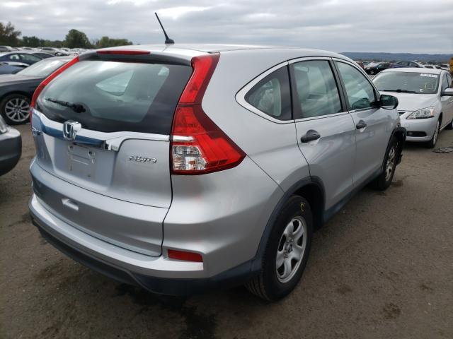 Photo 3 VIN: 2HKRM4H30FH698915 - HONDA CR-V LX 