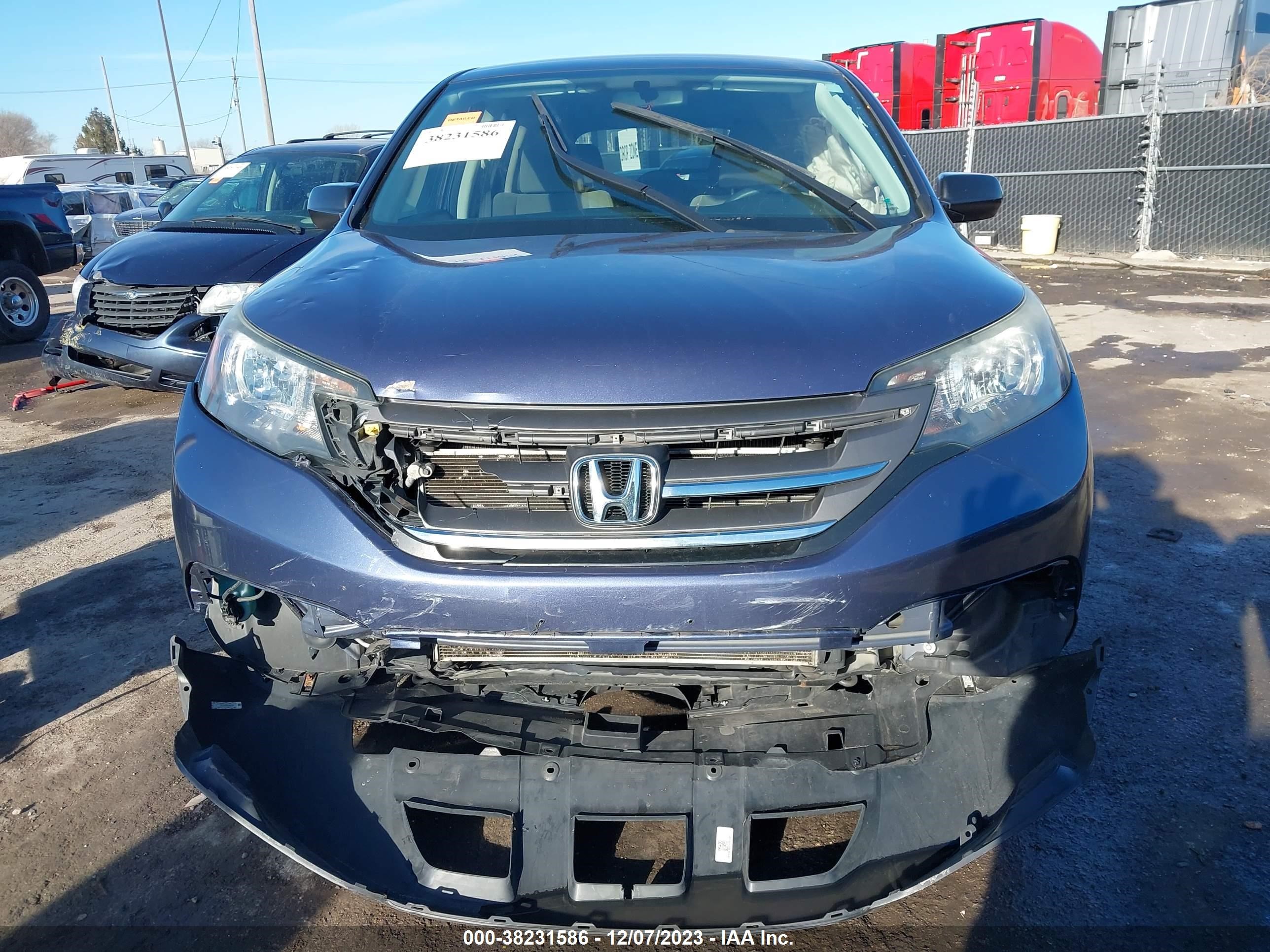 Photo 10 VIN: 2HKRM4H32EH635281 - HONDA CR-V 