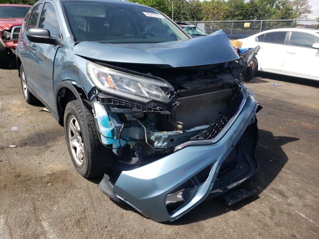 Photo 8 VIN: 2HKRM4H32FH636593 - HONDA CR-V LX 