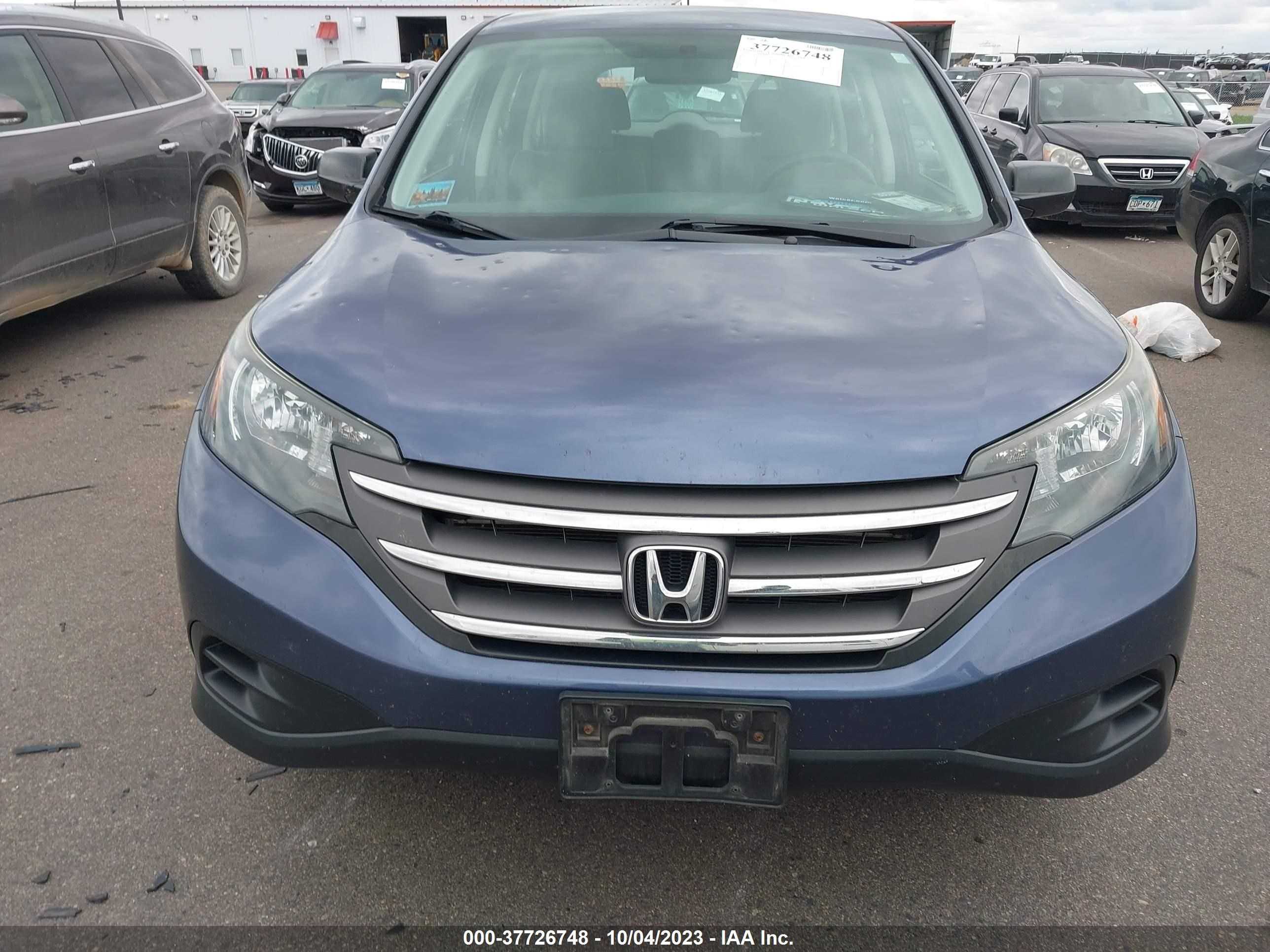 Photo 11 VIN: 2HKRM4H34EH697197 - HONDA CR-V 