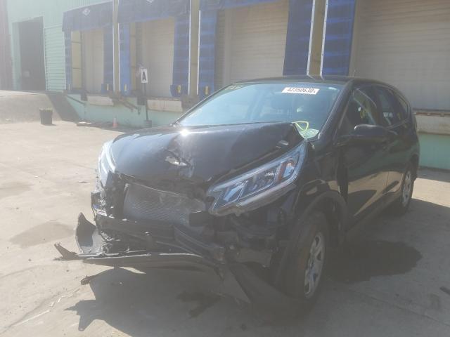 Photo 1 VIN: 2HKRM4H34GH667877 - HONDA CR-V LX 