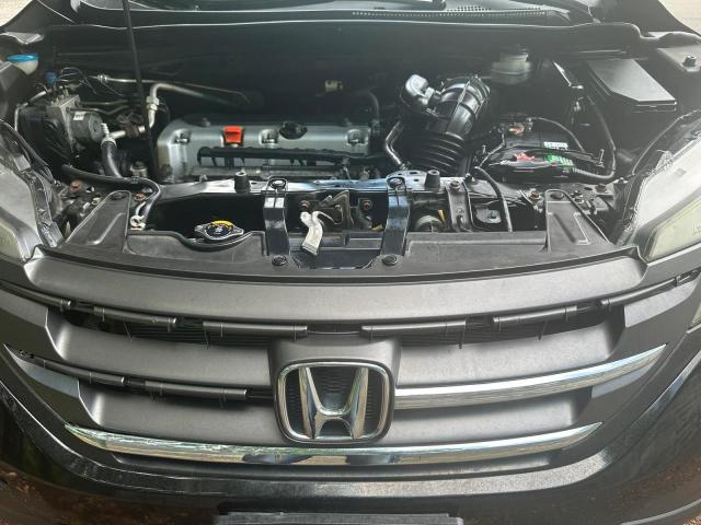 Photo 4 VIN: 2HKRM4H35EH635856 - HONDA CR-V LX 