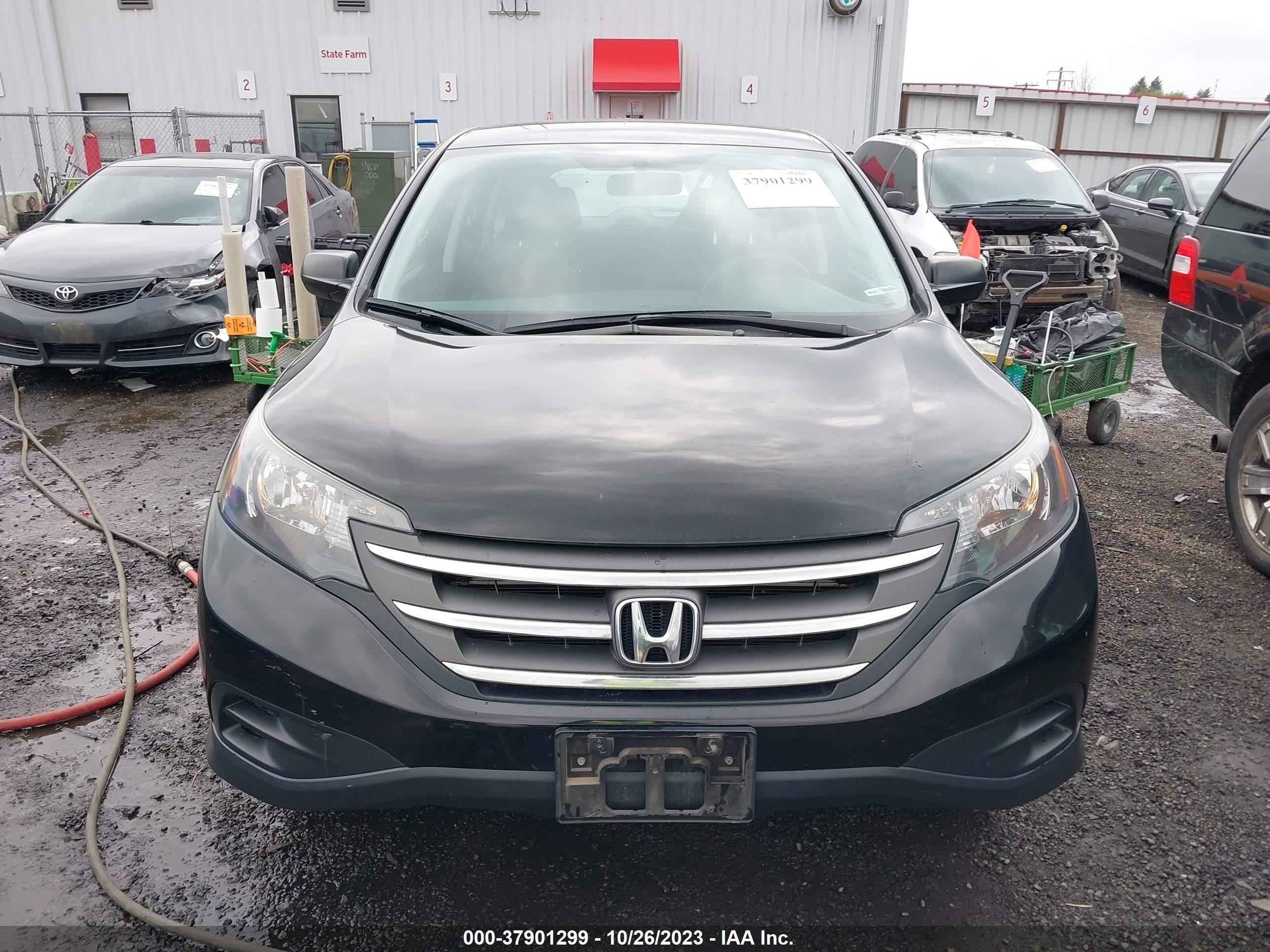 Photo 12 VIN: 2HKRM4H36EH619570 - HONDA CR-V 