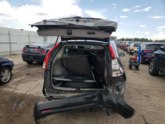 Photo 8 VIN: 2HKRM4H37EH715143 - HONDA CR-V LX 