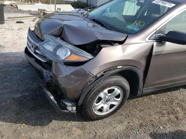 Photo 8 VIN: 2HKRM4H38EH714132 - HONDA CR-V LX 