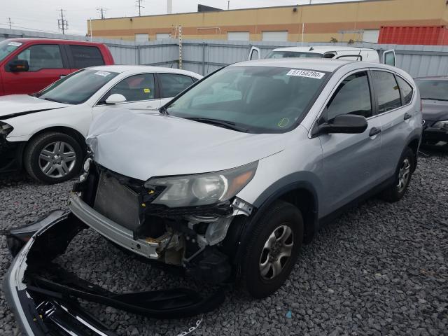 Photo 1 VIN: 2HKRM4H39DH107168 - HONDA CR-V LX 