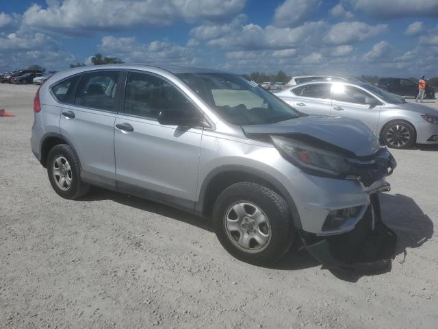 Photo 3 VIN: 2HKRM4H39GH623020 - HONDA CR-V LX 