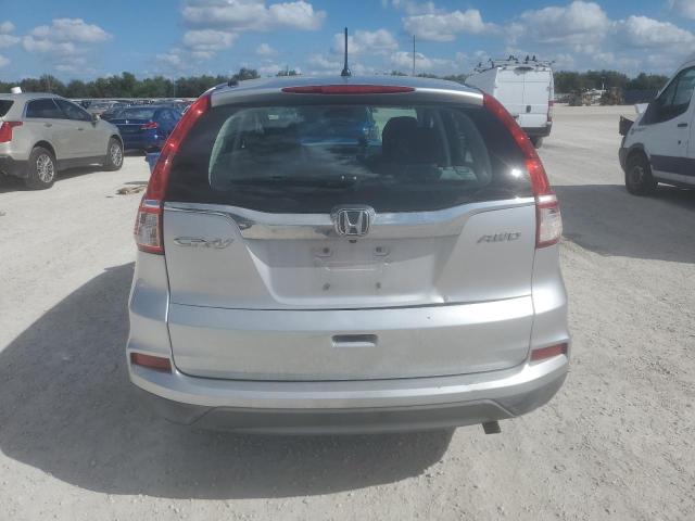 Photo 5 VIN: 2HKRM4H39GH623020 - HONDA CR-V LX 