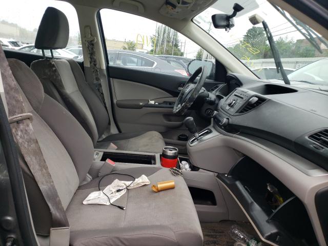 Photo 4 VIN: 2HKRM4H3XCH628415 - HONDA CR-V LX 