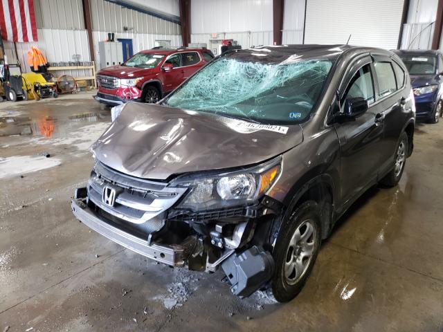 Photo 1 VIN: 2HKRM4H3XEH660929 - HONDA CR-V LX 