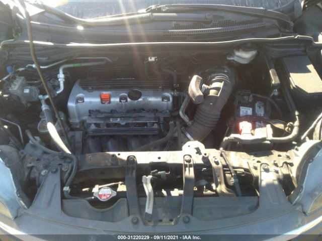 Photo 9 VIN: 2HKRM4H3XEH697348 - HONDA CR-V LX 