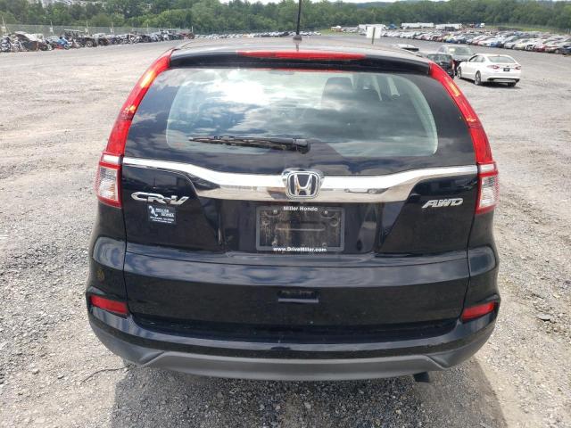 Photo 5 VIN: 2HKRM4H3XGH668709 - HONDA CR-V LX 