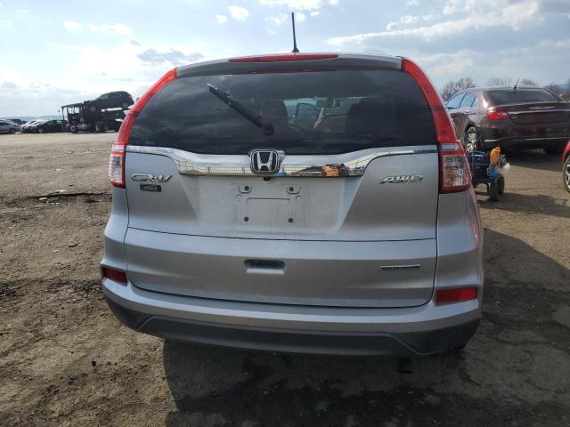 Photo 5 VIN: 2HKRM4H40GH636988 - HONDA CR-V SE 