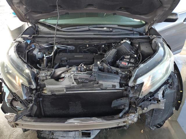 Photo 11 VIN: 2HKRM4H40GH647747 - HONDA CR-V SE 