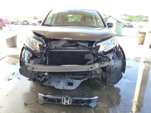 Photo 4 VIN: 2HKRM4H40GH647747 - HONDA CR-V SE 