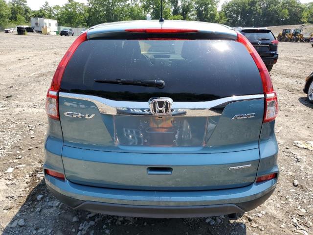 Photo 5 VIN: 2HKRM4H40GH650390 - HONDA CR-V SE 